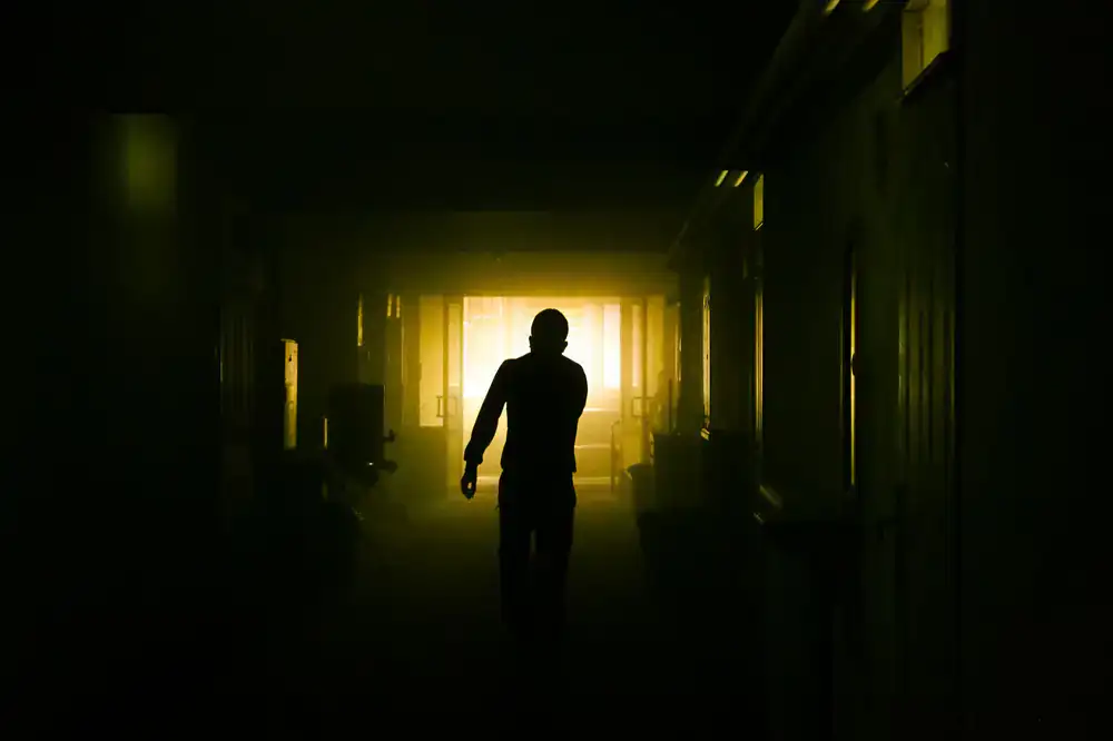 Cinematic dark view of a decaying hallway